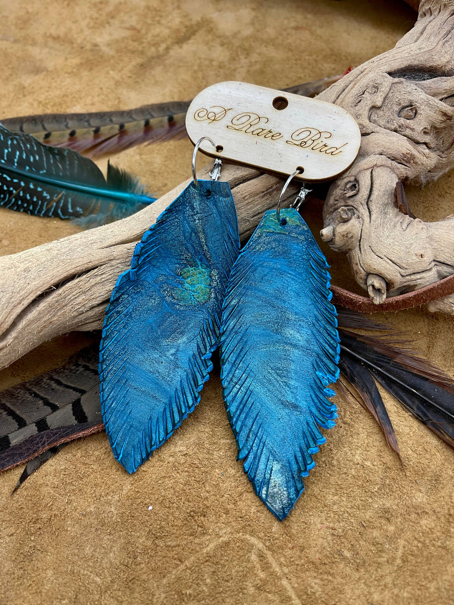 Hand-cut Turquoise Swirl Leather Feather Earrings
