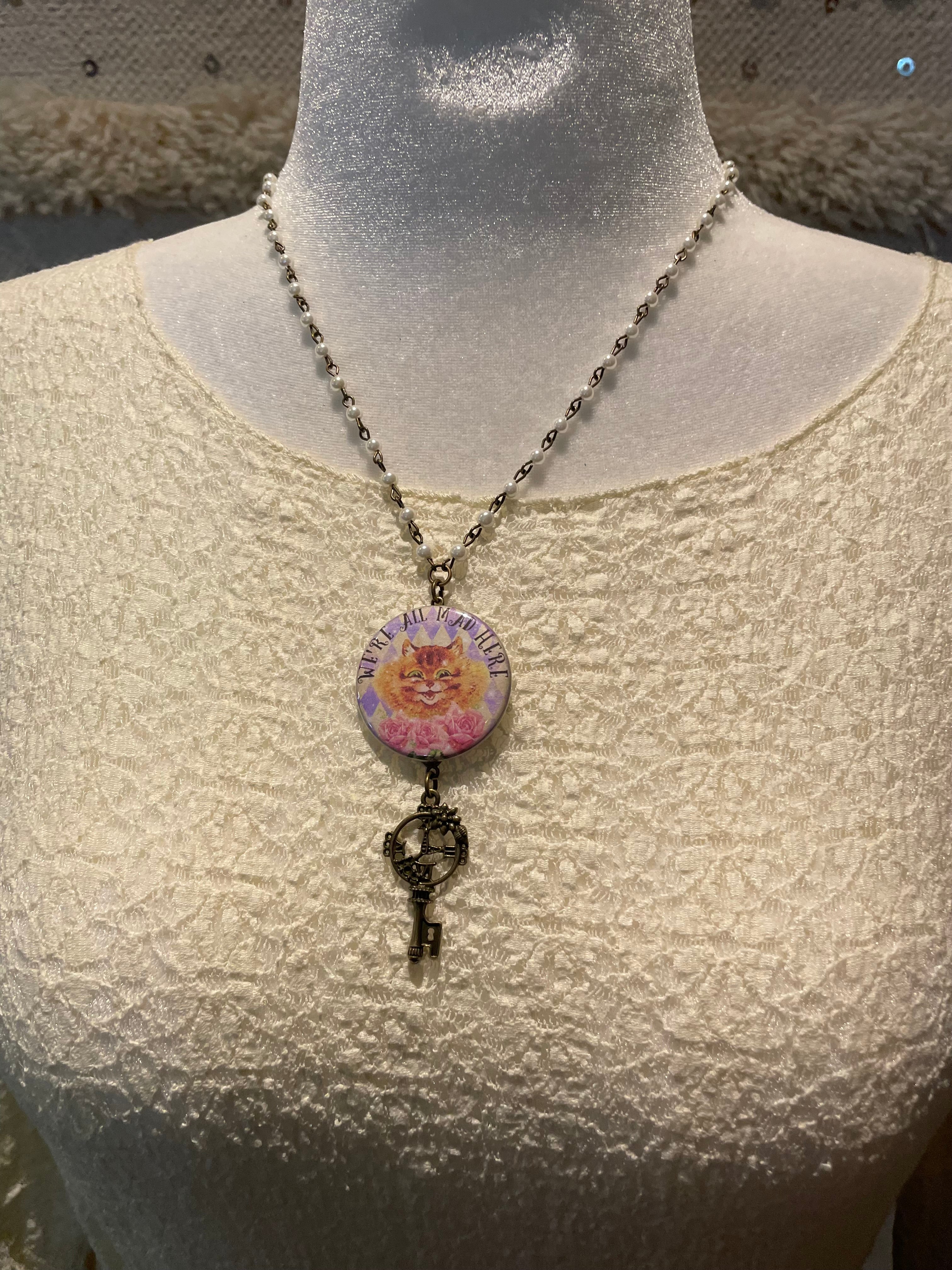 We're All Mad Here Button Necklaces by Gina