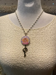 We're All Mad Here Button Necklaces by Gina