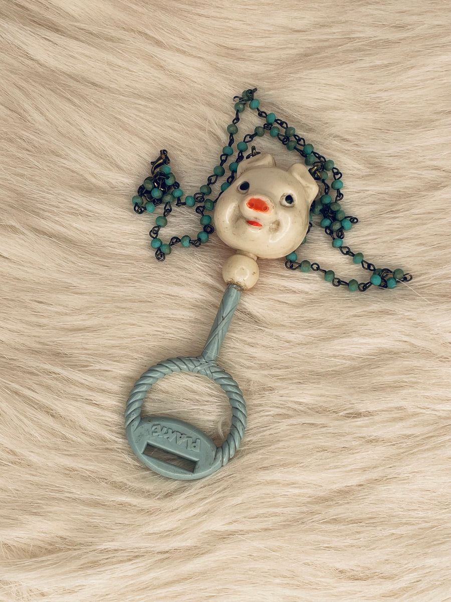Piggy Rattle Necklace by Gina