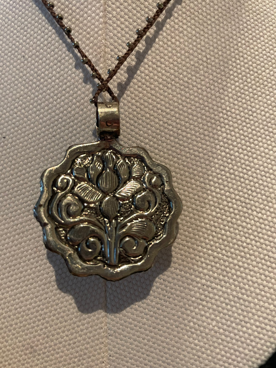 Sun Face Carved in Bone Necklace by Tara Gasparian