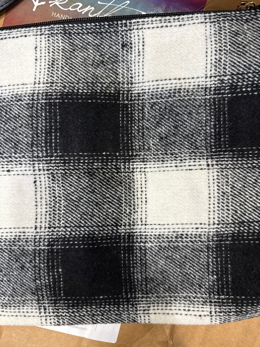 Crossbody handbags with wristlet straps