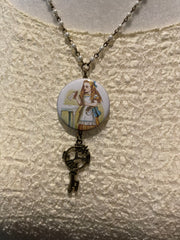 Drink Me Button Necklaces by Gina