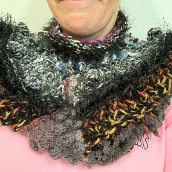 Hand knit in one piece soft infinity scarf adornment with multiple stitch and color factory textures. Winter scarf.